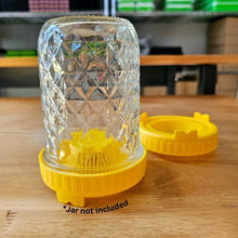 Load image into Gallery viewer, Yellow sprouting jar lid used with a 16oz wide mouth mason jar in the inverted draining position for sprouting