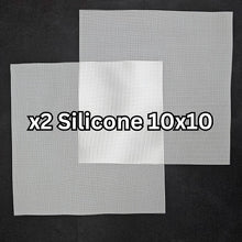 Load image into Gallery viewer, Two 10x10 silicone reusable grow mediums shown on dark background
