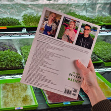 Cargar imagen en el visor de la galería, Back cover of On The Grow 36 Easy and Unique Microgreens Recipes cookbook showing full recipe list, held in grow room
