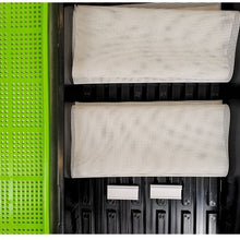 Load image into Gallery viewer, Two white mesh filters on a black frame with a green base.
