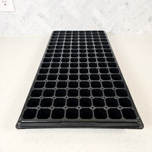 Cargar imagen en el visor de la galería, Angled view of the On The Grow 128-cell plug tray in 10x20 size showing uniform cell grid and drainage holes
