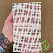 Cargar imagen en el visor de la galería, On The Grow small sprouting tray reusable silicone grow medium held in hand showing 1.2mm mesh surface
