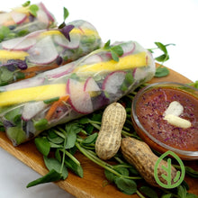 Load image into Gallery viewer, Spring rolls filled with radish microgreens and mango served with peanut sauce, from 36 Microgreens Recipes by On The Grow
